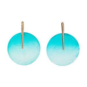 Pendientes redondos con conchas