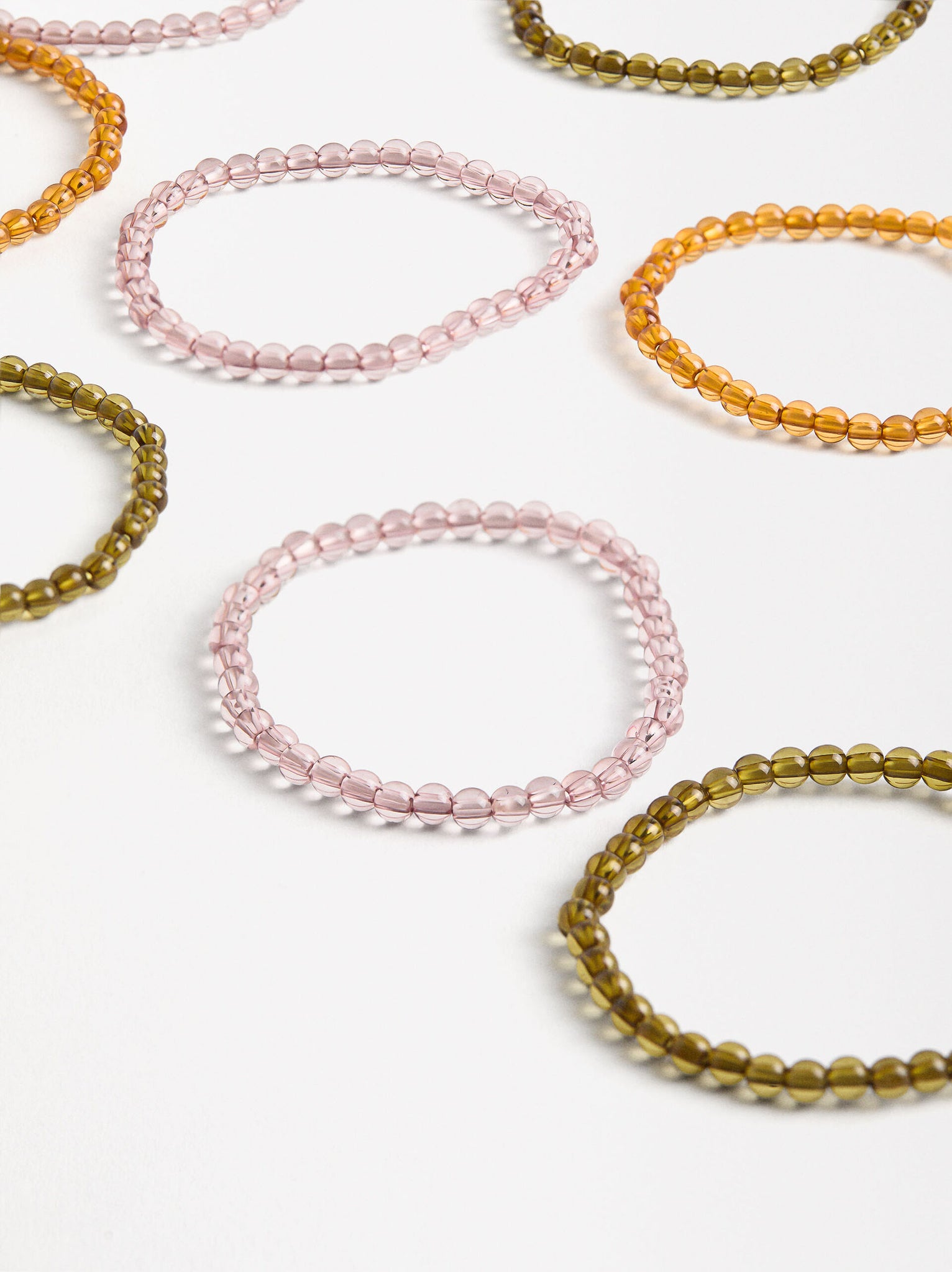 Set de pulseras elásticas transparentes