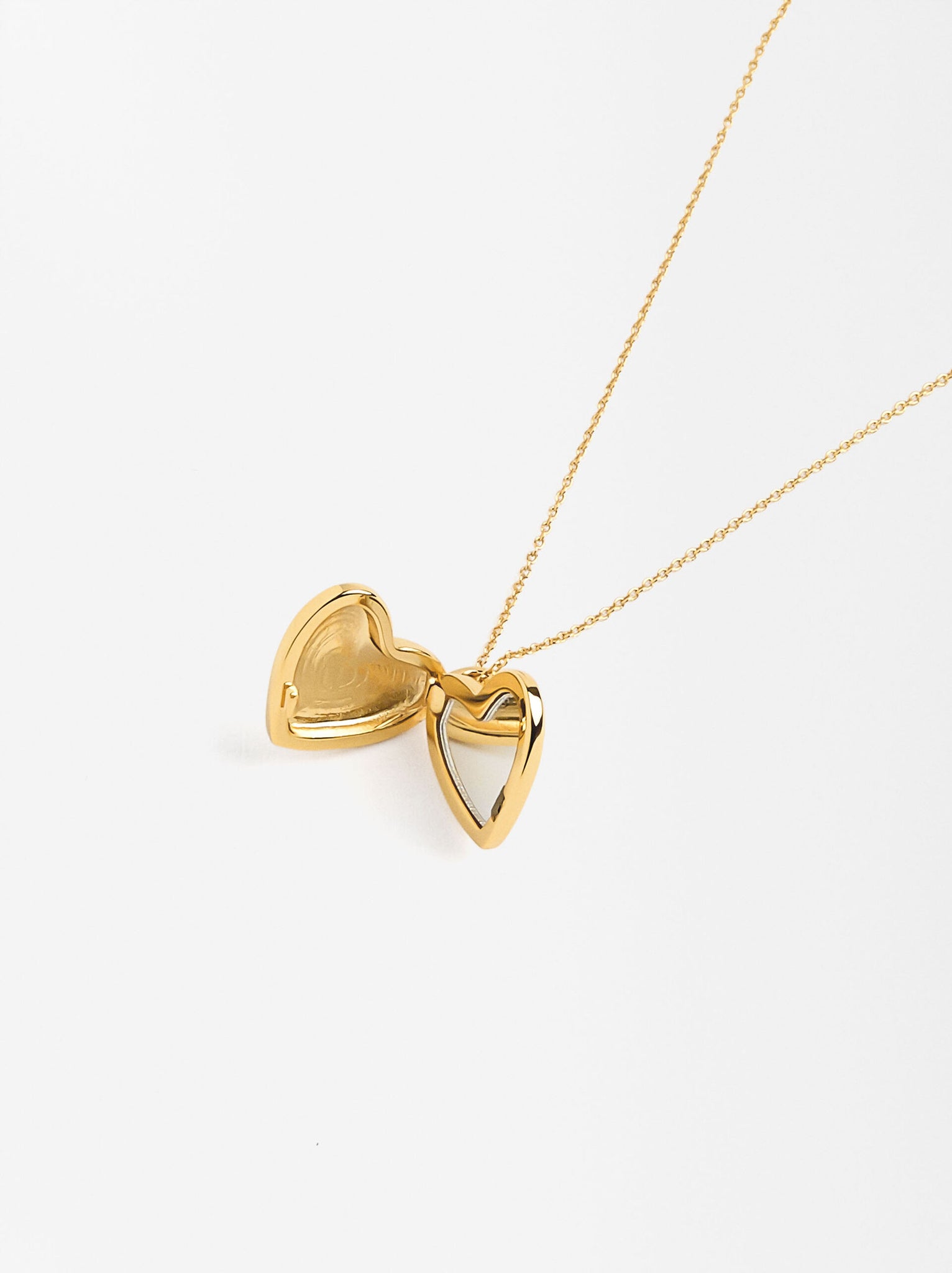 Collar corazón relicario baño oro 18k