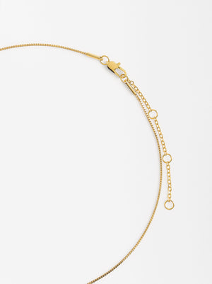 Collar corto medalla cruz baño oro 18k